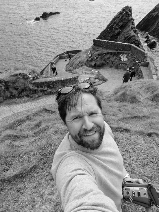 Selfie of one of the co-founders of Love Your Spot,Chris, with a beach in the background
